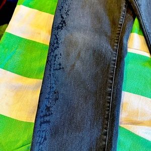 Express Jeans. Black faded with design on legs. Almost new condition.